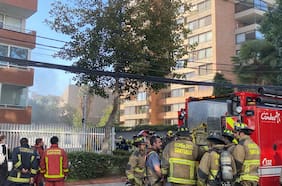 Vehículo en llamas en estacionamiento subterráneo genera evacuación de un centenar de personas en edificio residencial de Las Condes