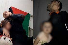 El dramático registro de un padre protegiendo a su hija en medio de un bombardeo en Gaza
