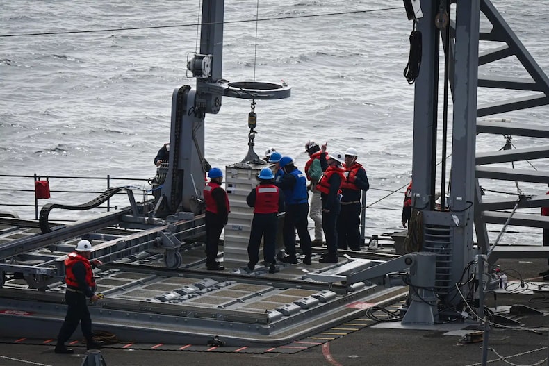 What is the US Navy's At-Sea Missile Reloading System and how does it relate to tensions with China?