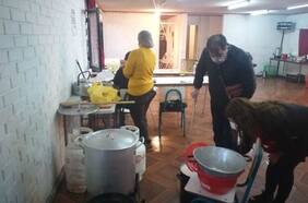 Entre Todos: Cómo ayudar con cajas de leche a niños de Estación Central