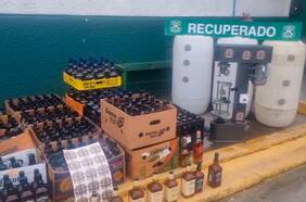 Desmantelan laboratorio clandestino donde falsificaban licores de marca en El Bosque: un detenido y 1.200 botellas incautadas