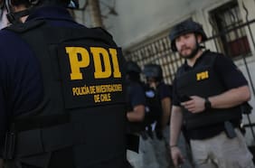 Amenazaban a residentes con armas para arrebatarles sus viviendas: desalojo de departamentos tomados en Talca termina con 16 detenidos