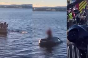 Rescatan a dos pasajeros que se estrellaron en un Tesla contra un puerto en Oslo
