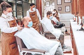 Principal peluquería española para hombres mira a Chile