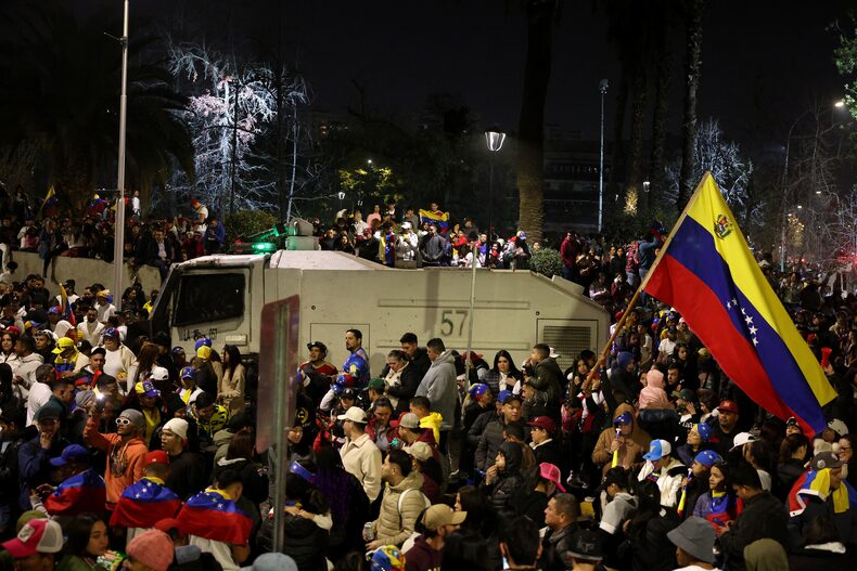 Voting during Venezuela's presidential elections, at the Venezuelan Embassy in Santiago