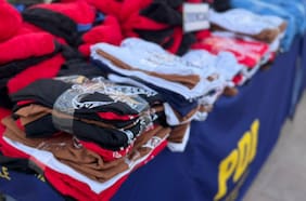 PDI desbarata taller de ropa falsificada en Cerrillos: avalúo de prendas y maquinarias supera los $18 millones