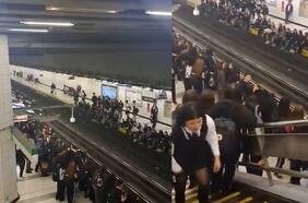 Retraso en Línea 5 del Metro: escolares se sientan al borde del andén en estación Santa Isabel