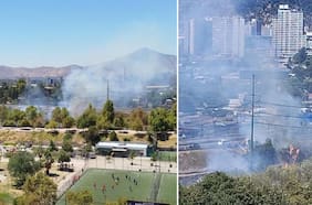 Bomberos combate incendio forestal cerca del Parque de los Reyes en Santiago