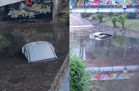 Vehículos terminan hundidos en paso bajo nivel inundado por la lluvia en Ñuñoa
