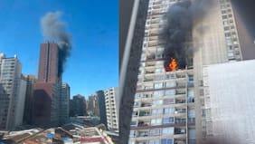 Bomberos busca apagar incendio en edificio de departamentos en Santiago Centro: recinto tuvo que ser completamente evacuado