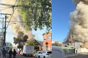 Bomberos combate contra incendio de panadería de Cerro Navia