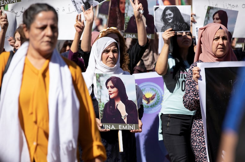 Women demonstrate against the death of Mahsa Amini in Iran's Kurdish-controlled town of Qamishli