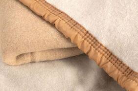 Frazadas: ¿cuál es el mejor material para abrigar la cama?