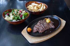 Bebequ: la nueva terraza con sabor a brasas y coctelería de autor