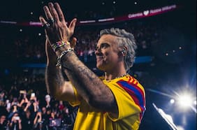 Éxitos, interacciones y un guiño a Oasis, el grupo que nunca lo aceptó: cómo es el show que Robbie Williams trae a Chile