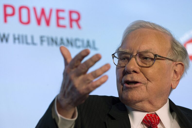 FILE PHOTO: Warren Buffett, CEO and chairman of Berkshire Hathaway Inc, speaks at a National Auto Dealers Association event in New York