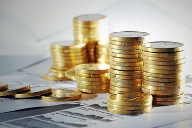 Business diagram on financial report with coins TFGP.