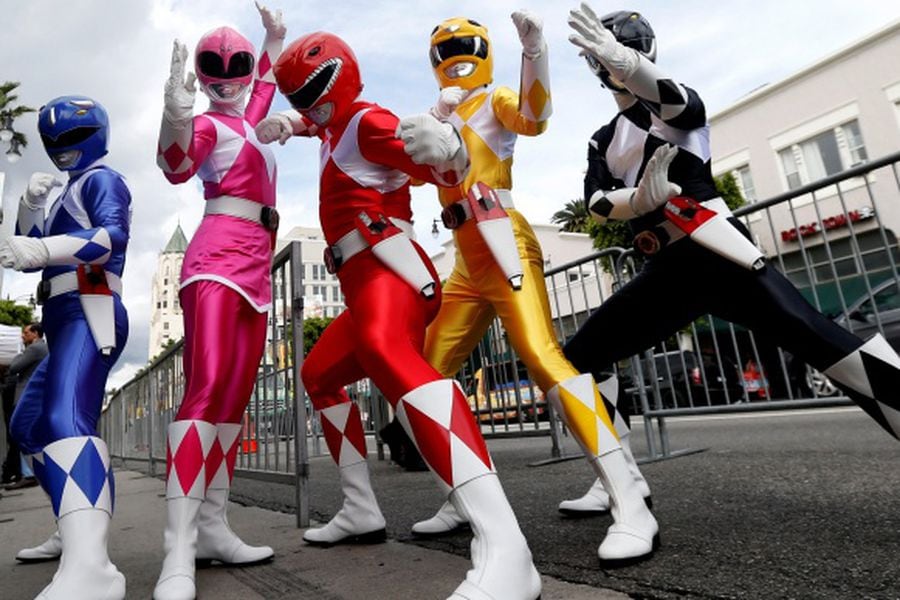 People dressed like the characters of Power Rangers pose at the unveiling of the star for Israeli-American producer Haim Saban on the Hollywood Walk of Fame in Los Angeles