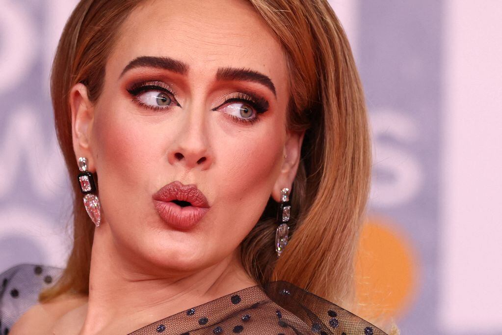 FILE PHOTO: Adele poses as she arrives for the Brit Awards at the O2 Arena in London, Britain, February 8, 2022 REUTERS/Tom Nicholson/File Photo