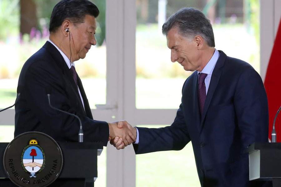 Argentina's President Mauricio Macri and his China's counterpart Xi Jinping shake hands before the news conference after their meeting at the Olivos Presidential Residence in Buenos Aires