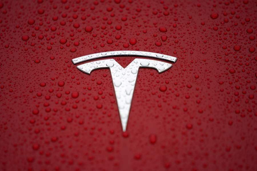 FILE PHOTO: FILE PHOTO: A Tesla logo is seen at a groundbreaking ceremony of Tesla Shanghai Gigafactory in Shanghai