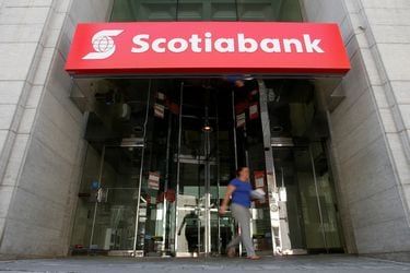 FILE PHOTO: FILE PHOTO: A woman leaves a Scotiabank branch in Ottawa
