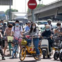 En China, la generación desencantada añora la vida lejos de las megaciudades 