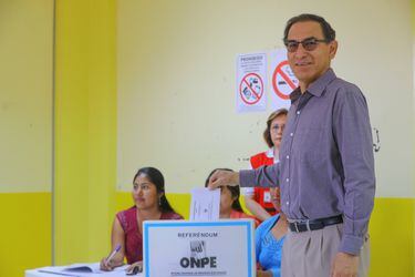 Peru's President Martin Vizcarra votes during a referendum on judicial and political reforms in Lima