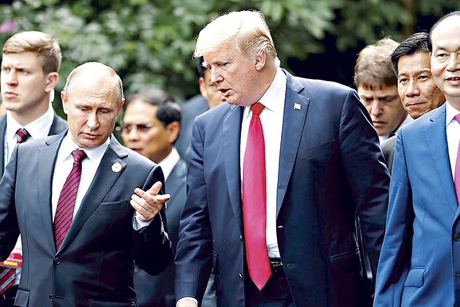 El Presidente ruso, Vladimir Putin, y su homólogo estadounidense, Donald Trump,